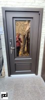 Входные двери Антарес Дверь « Виктория со стеклом и ковкой »